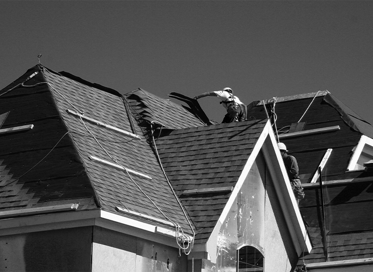 man working on roofing repair